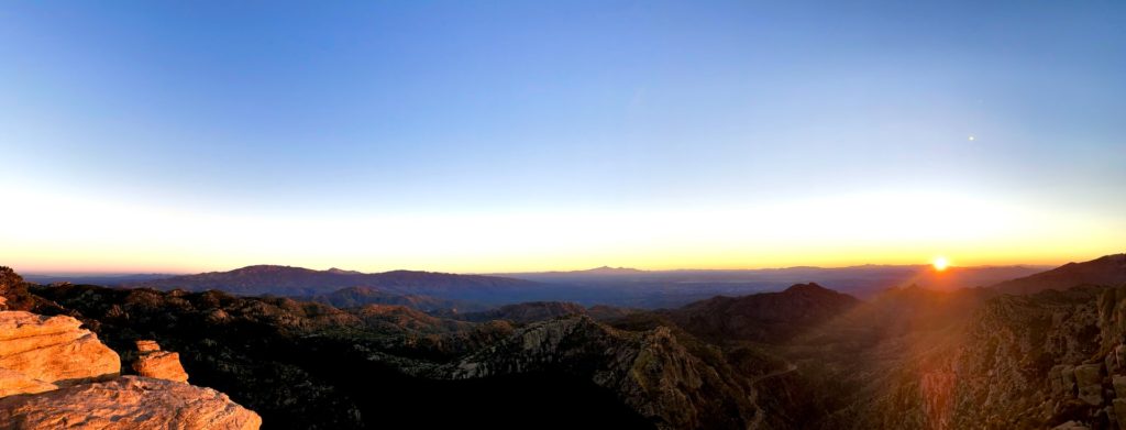 alt txt = "Mountains surrounded by the sunrise in Mount Lemmon."