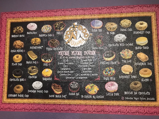 alt = "Donut menu at Voodoo Doughnut".