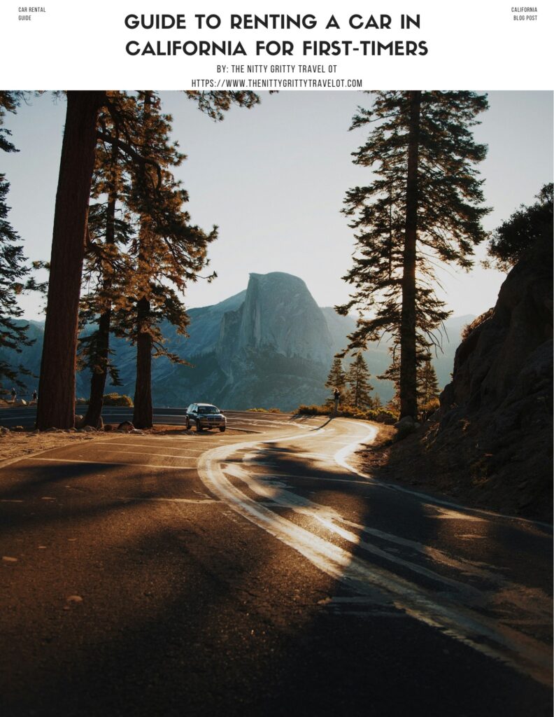 alt txt = "Lone car driving on a winding road surrounded by the sunrise and tall trees in California."